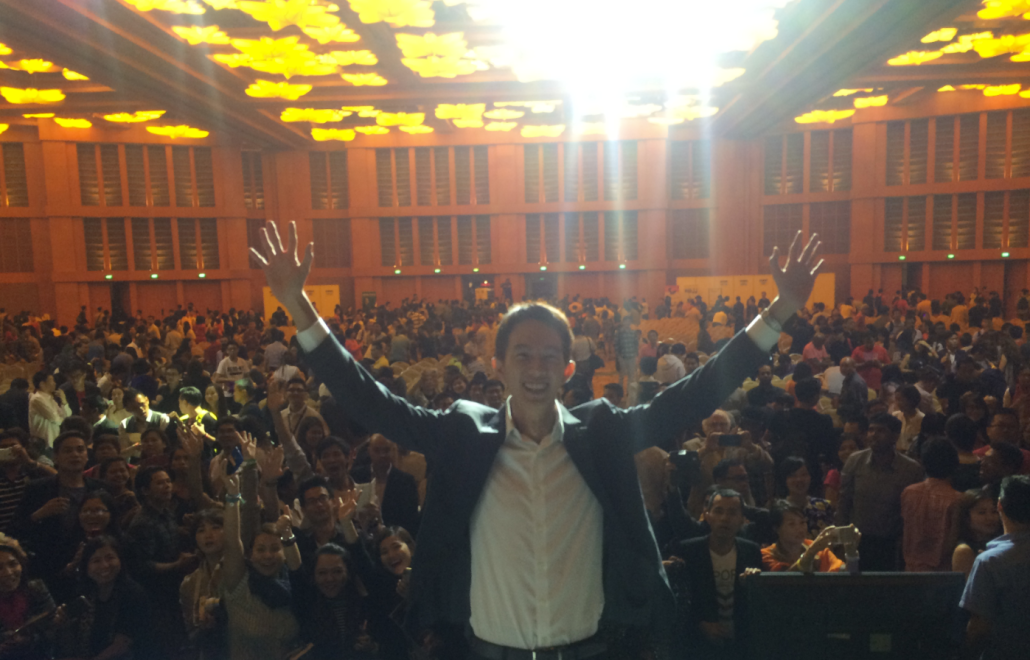 Spencer Li speaking to thousands at the National Achievers Congress (NAC)