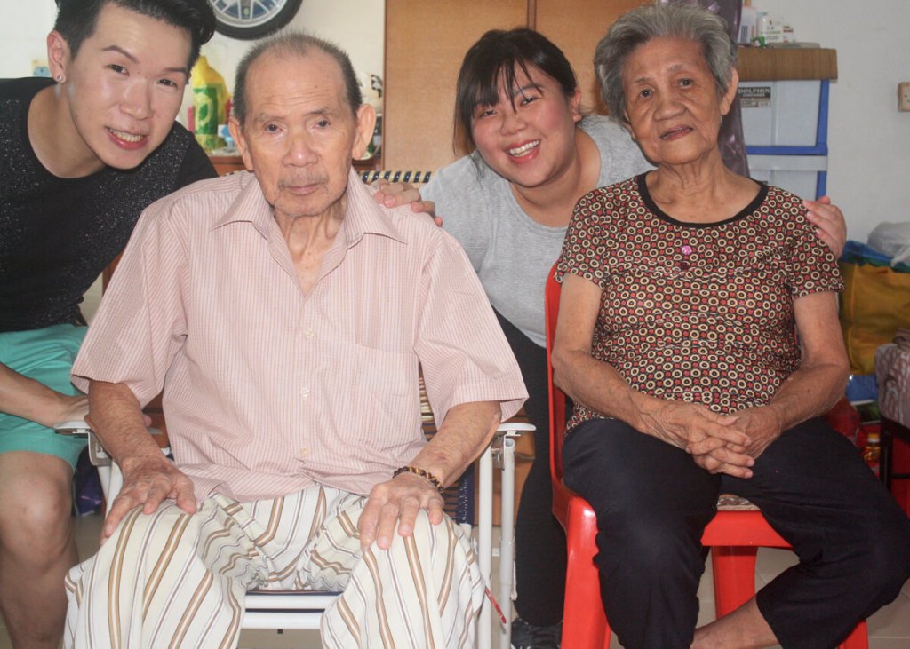 Rachel Tan and Timothy Huang visiting an elderly couple